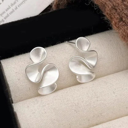 Elegant Earrings for Women with Flowy Gold Design