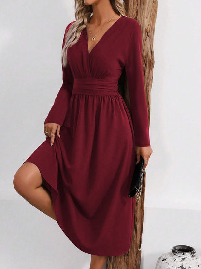 Elegant Wrap Midi Dress for Women with V-Neck Long Sleeve Asymmetric Hem Style