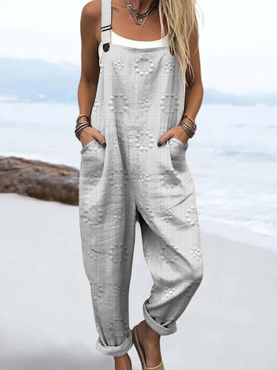 Effortless Floral Textured Jumpsuit for Women with Adjustable Strap Wide Leg Pocket Casual Style